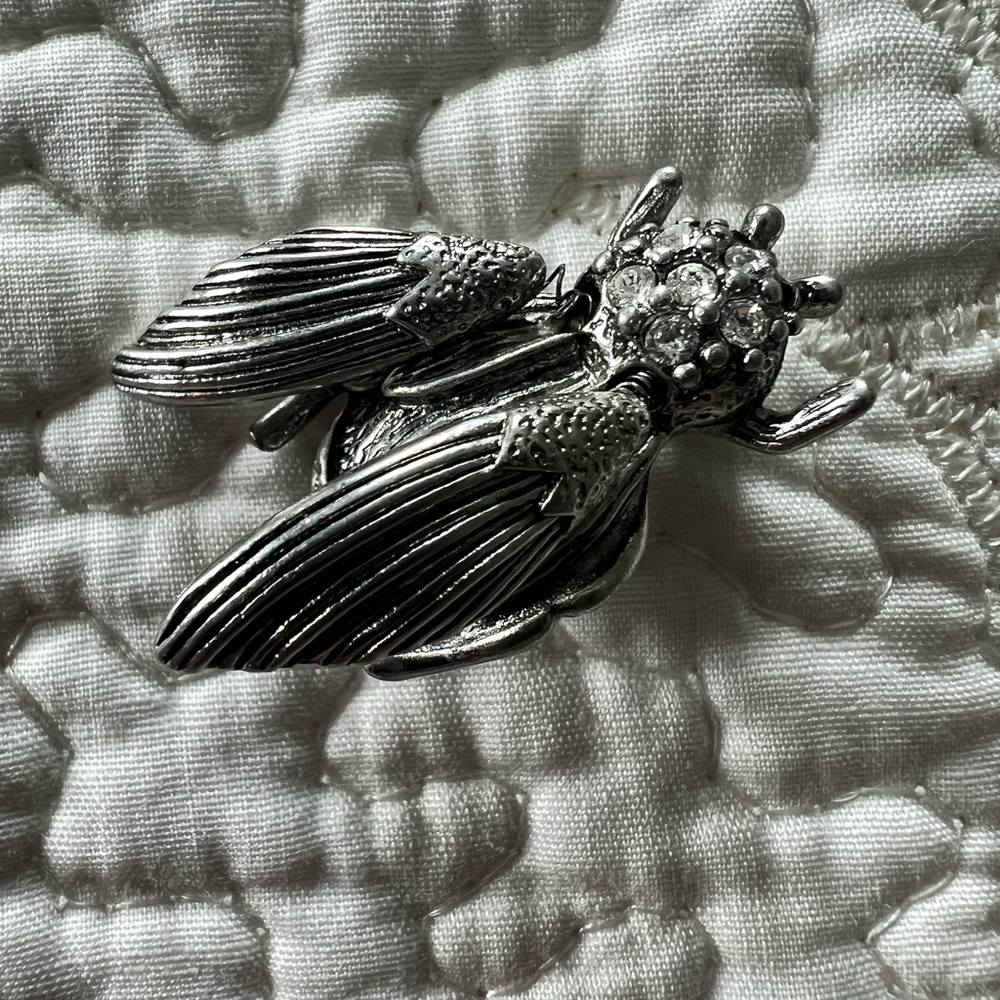 Marc Jacobs silver brooch with moving wings